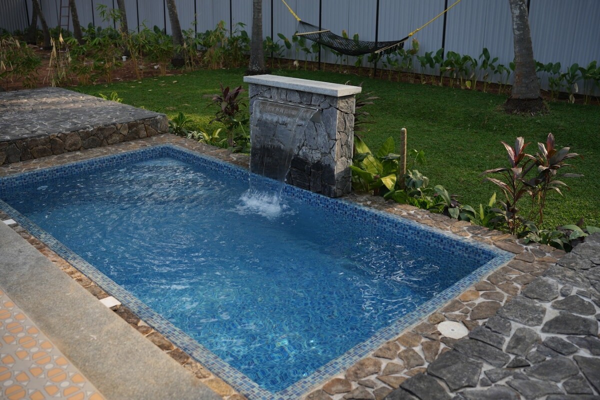 Stone Villa with Private Pool Nature Nest Pollachi - Tap to explore photos