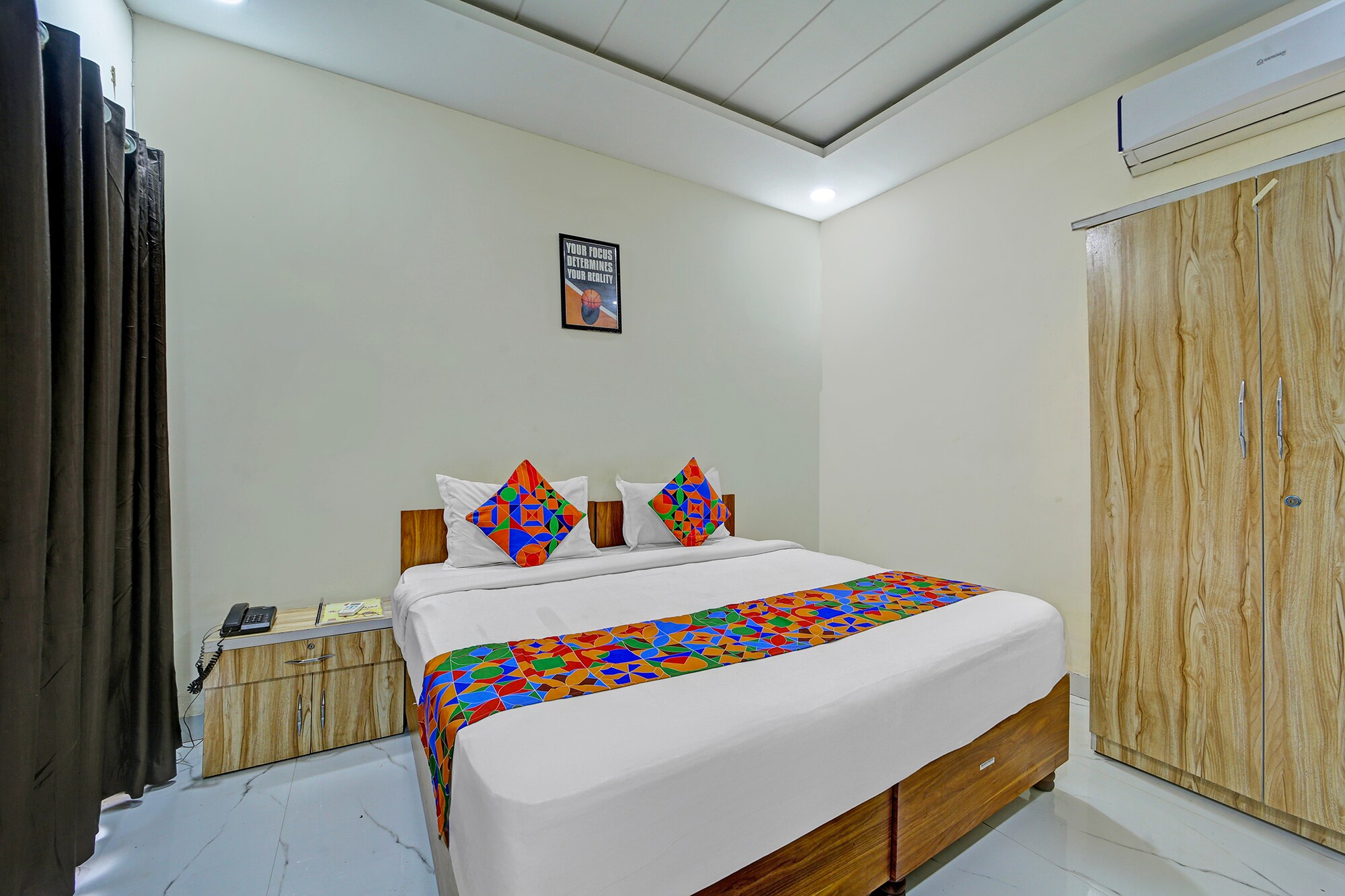 FabHotel Cressida - Tap to explore photos