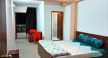 Elysian Home Food & Stay Room Type - 2: Standard King with balcony Elysian Home Food & Stay Room Type - 2: Standard King with balcony