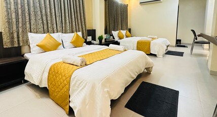 Hotel Sai Gurusthan Room Type - Deluxe Four Bed Non AC