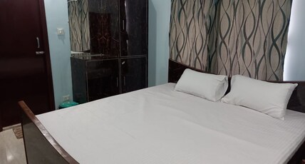 Niloy Guest House Room Type - Double Room with Balcony (Non AC Room) Niloy Guest House Room Type - Double Room with Balcony (Non AC Room)