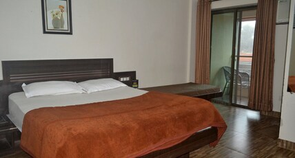 Hotel Rahil Plaza Room Type - Deluxe Room with balcony Non AC