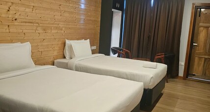 Daiatei Homestay | A boutique stay Room Type - Twin bedded Room With Balcony
