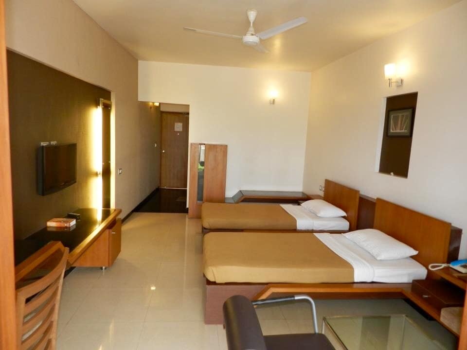 Hotel Rock Regency - Tap to explore photos
