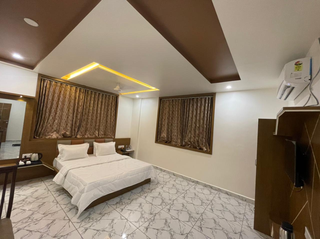 HOTEL MARIGOLD - Tap to explore photos