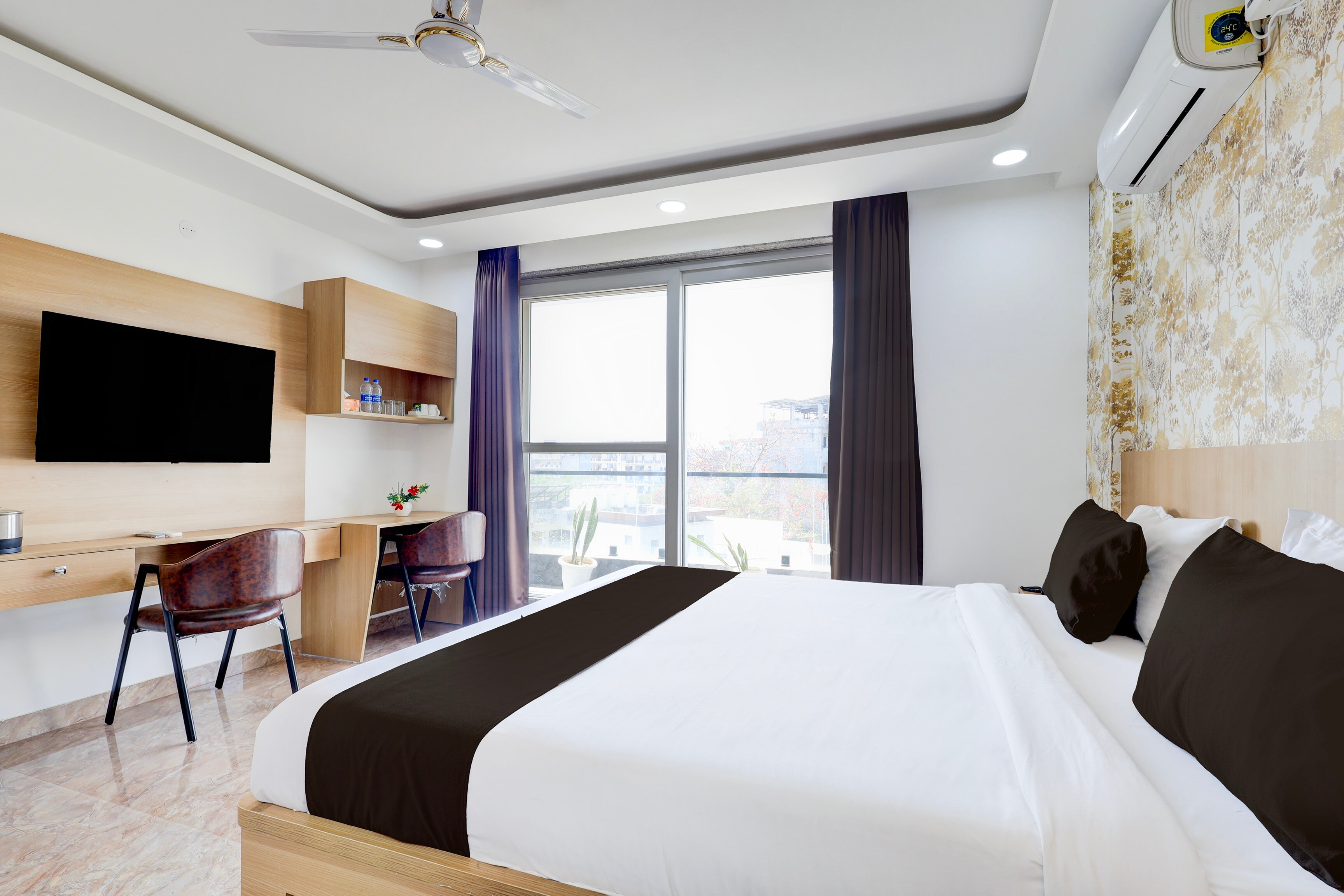 Hotel O Tasvi Stayz - Tap to explore photos