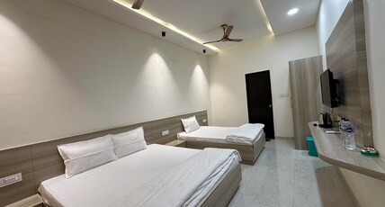LOG INN BANARAS Room Type - FAMILY ROOM  ( 1 KING SIZE AND 1 SINGLE BED)