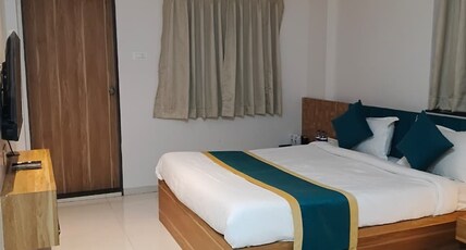 Lotus Suites Room Type - Super Deluxe AC with Balcony
