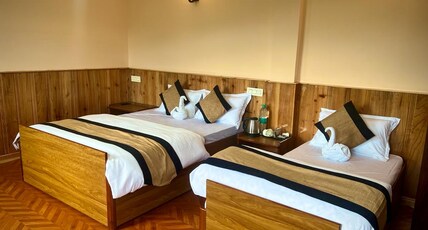 Hotel OM residency Room Type - Quad Room with View