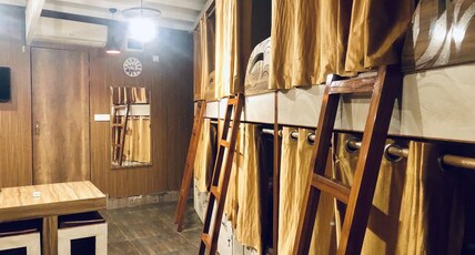 NomadsHouse | Rooms & Dorms Room Type - Mixed Dorm |1 bed in 8 Bunk Bed AC Dorm | Shared Washrooms
