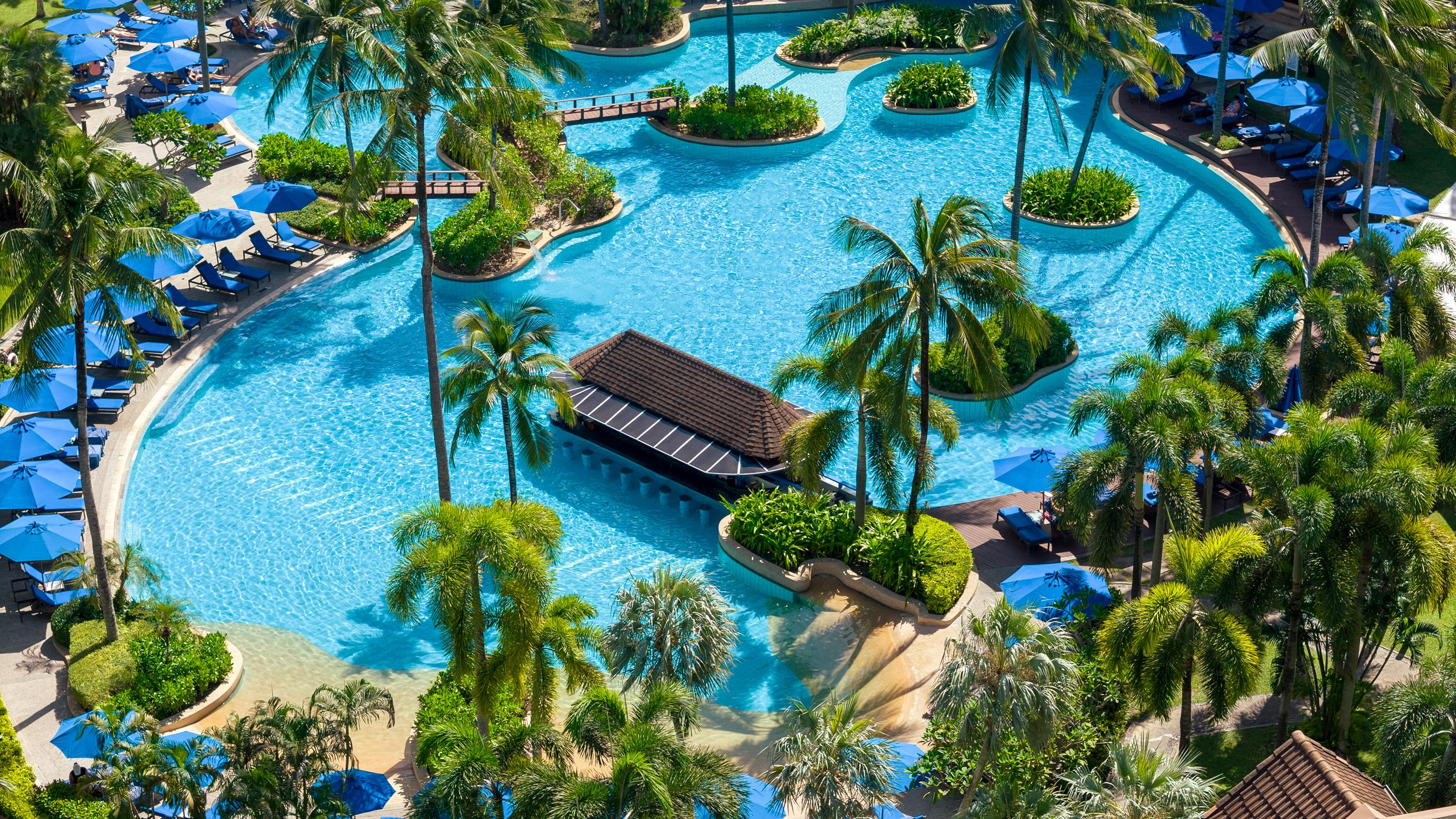 Phuket Marriott Resort & Spa, Merlin Beach - Tap to explore photos
