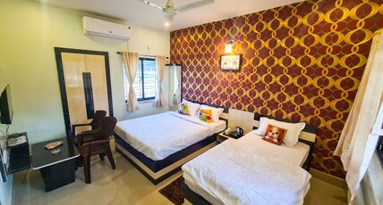 Resort Sanjhbati Room Type - AC DELUXE TRIPLE BED
