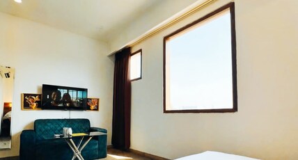 THE KAILASHA RESIDENCY Room Type - Bedroom 1