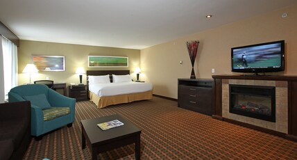 Holiday Inn Express & Suites VERNON Room Type - 1 King Suite Jetted Tub Fireplace Sofa