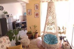 AaryaStays: Boho 2BHK with Higher Floor Hill View and Car Parking