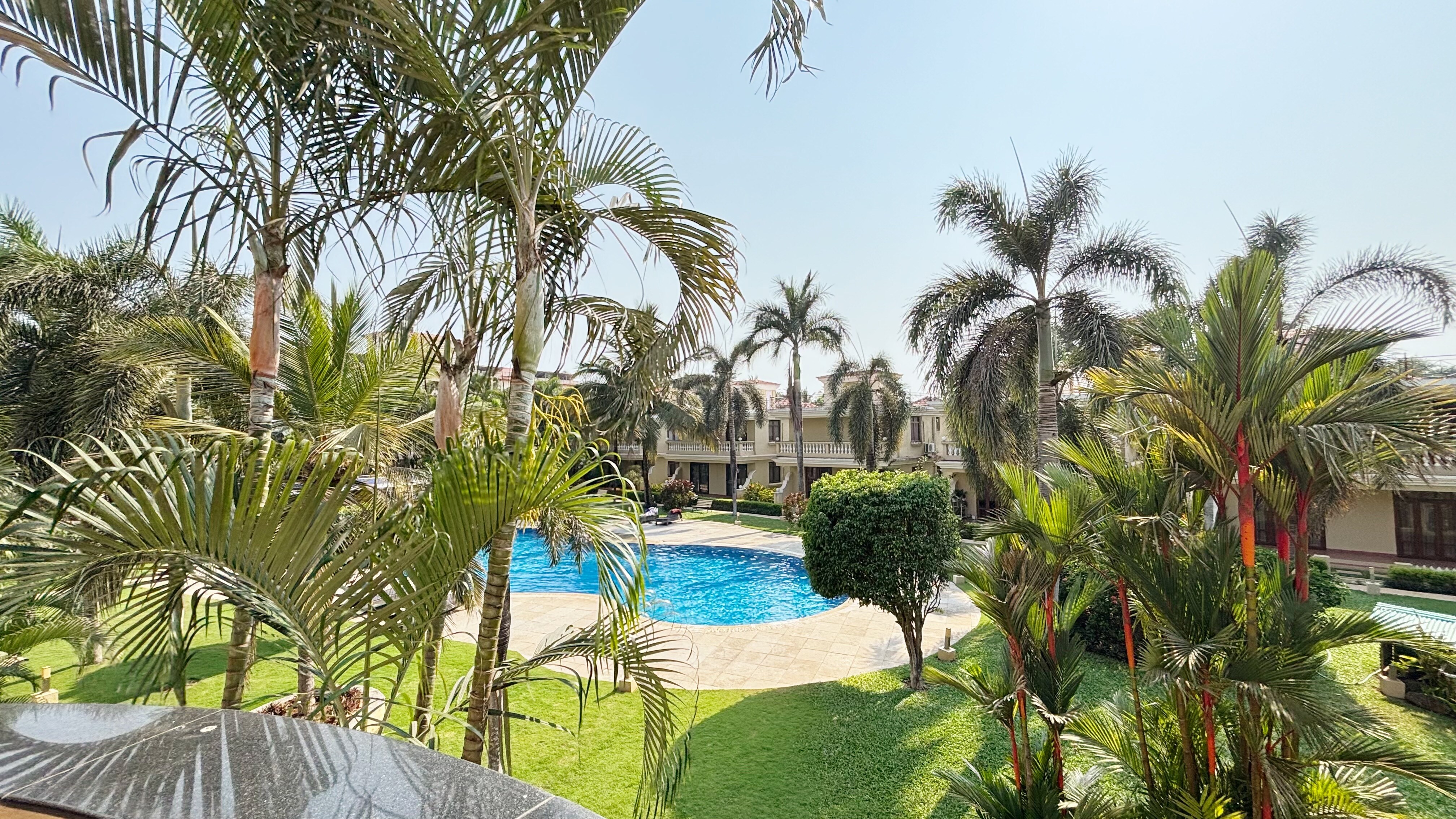 The poolside charm  Goa - Tap to explore photos