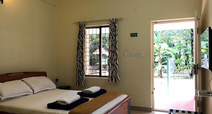 Palm Grove Service Villa | Rooms & Wi-Fi Room Type - Standard Non Ac Room Palm Grove Service Villa | Rooms & Wi-Fi Room Type - Standard Non Ac Room