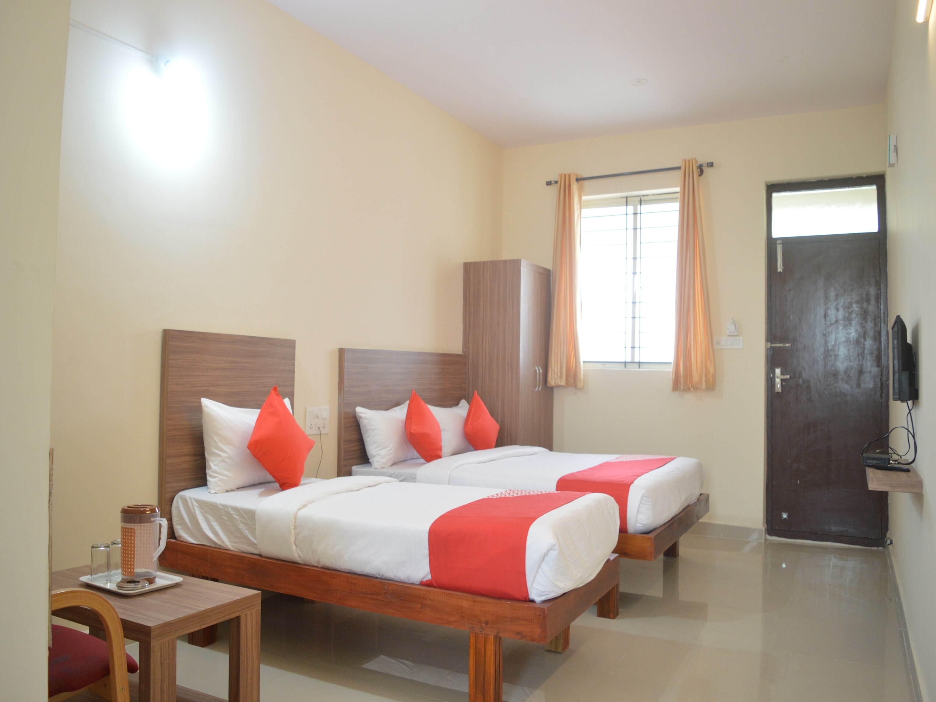 Hotel O New Champion Residency - Tap to explore photos
