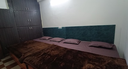 Shivlok guest house Room Type - Four person AC room Shivlok guest house Room Type - Four person AC room