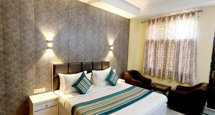 Khusbu Residency Room Type - Deluxe Room