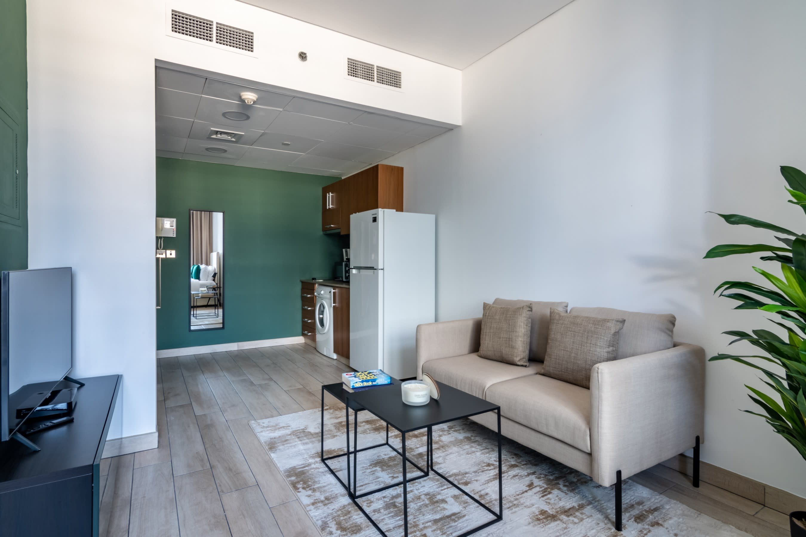 Silkhaus Burj Daman Apartments - Tap to explore photos