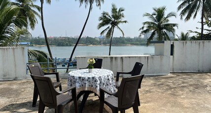 CRADLE N PALMS | BEACHSIDE HOMESTAY Room Type - Terrace - River View
