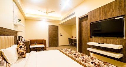Ecotel Hotel Room Type - Suite with 24 Hr Checkin & Checkout, 15 Percentage Off on F&B Ecotel Hotel Room Type - Suite with 24 Hr Checkin & Checkout, 15 Percentage Off on F&B