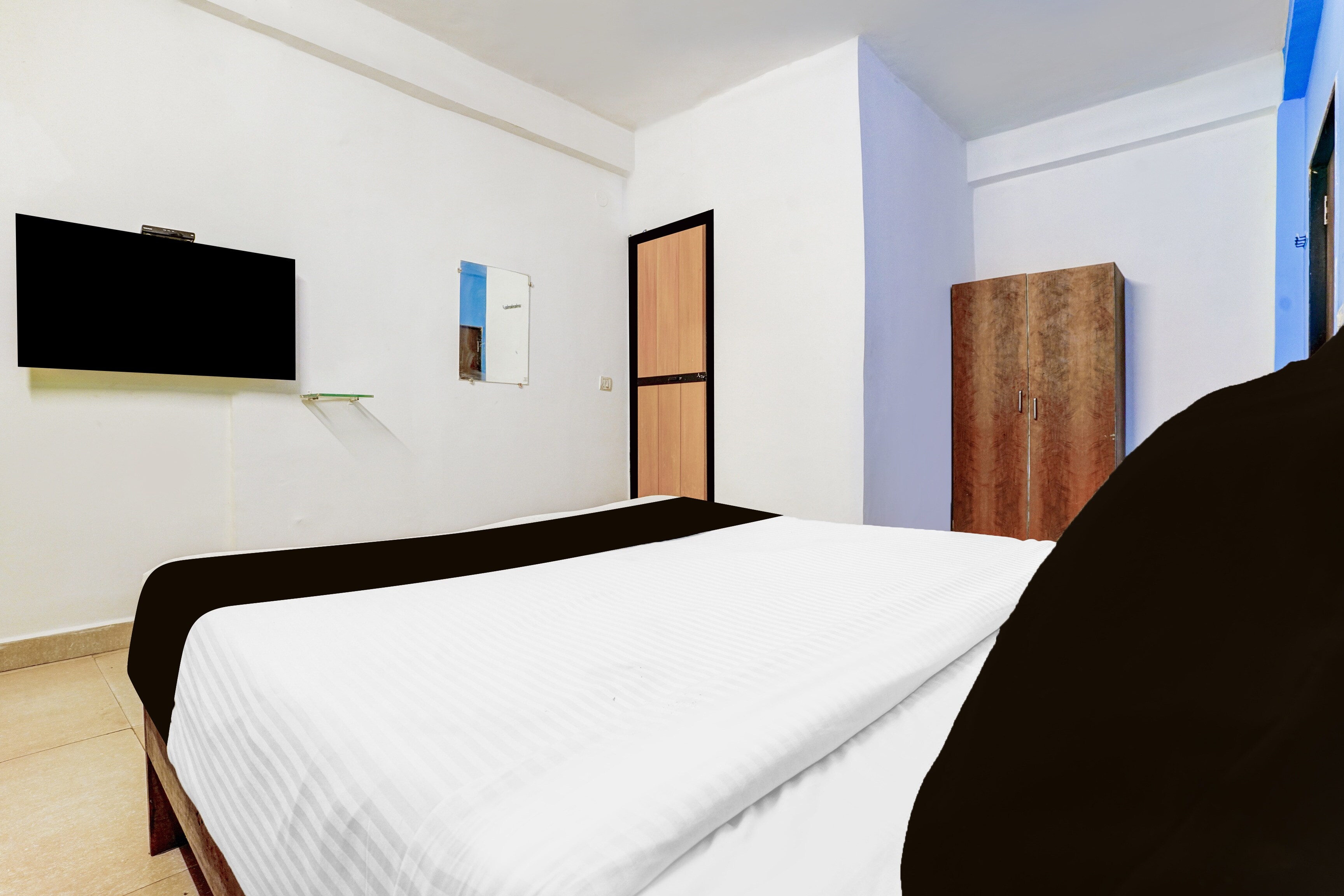 Hotel O KPN Holiday Homes - Tap to explore photos