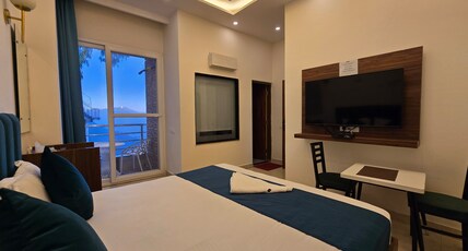 Hotel Divshikha Room Type - Semi Deluxe | Balcony and Valley View | NON-AC