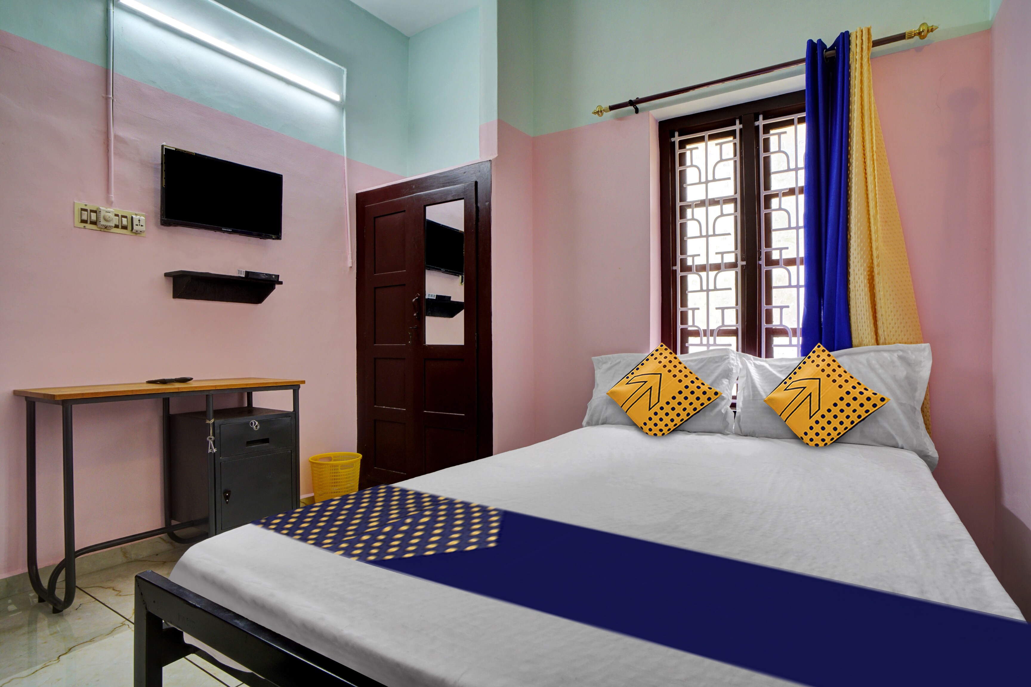 Hotel O Revathy Tourist Home - Tap to explore photos