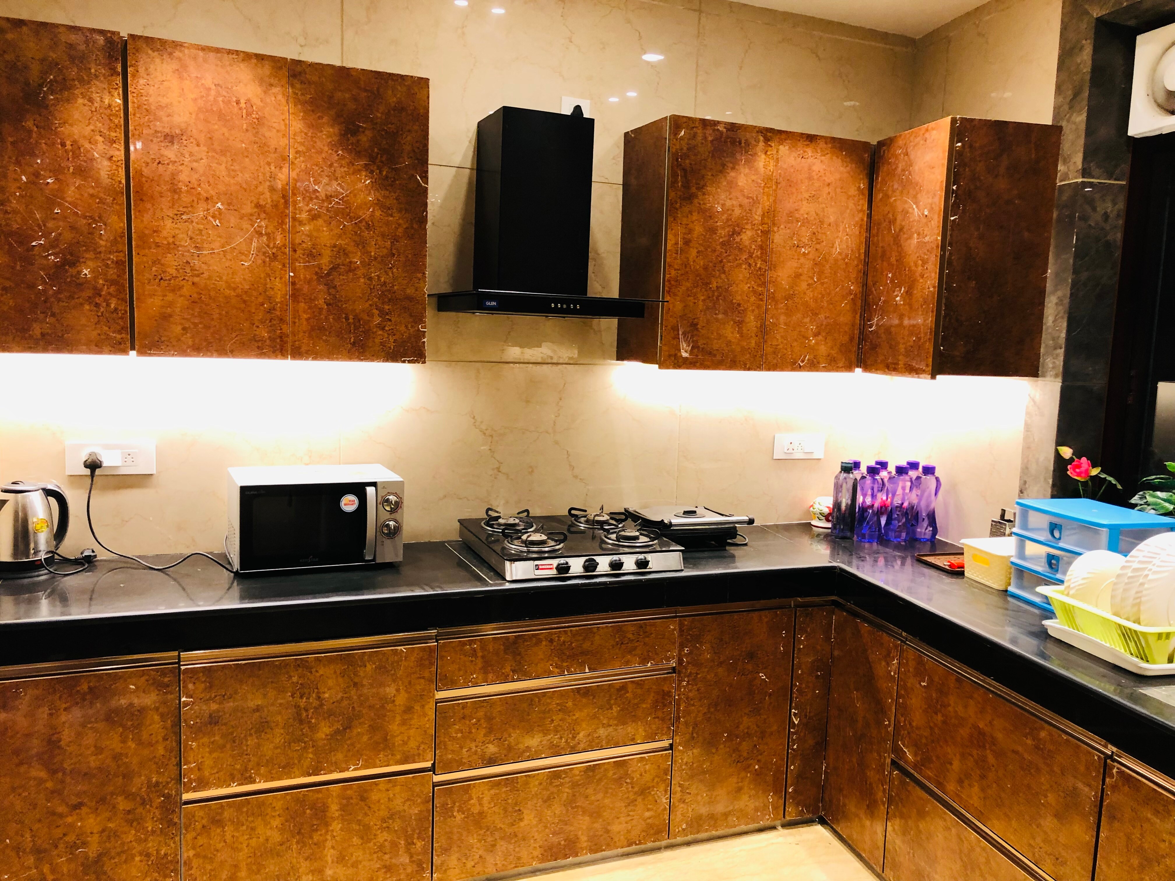 Divine Stay Rajouri Garden - Tap to explore photos
