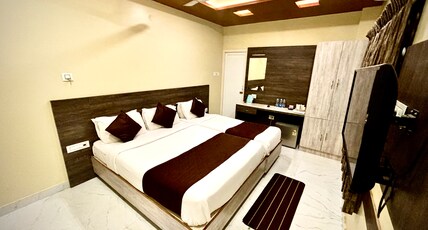 Udhayam Inn Room Type - Family Room Deluxe Air-Conditioned (01 QUEEN AND 01 SINGLE BED) Udhayam Inn Room Type - Family Room Deluxe Air-Conditioned (01 QUEEN AND 01 SINGLE BED)