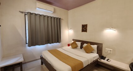 Hotel Grand Ashwin Room Type - Deluxe AC Room Hotel Grand Ashwin Room Type - Deluxe AC Room