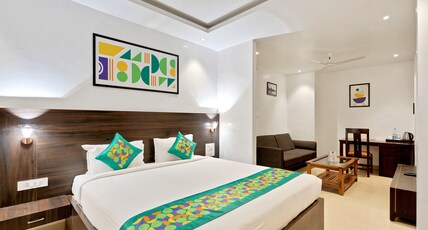 Treebo Aishwarya Grand - 4 Km From Promenade Beach Room Type - Premium Family Room