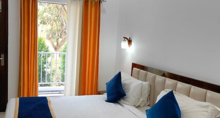 The Golden Mango Ramnagar Room Type - 1 Deluxe Bedroom | The Golden Mango |FF| By Homeyhuts_1