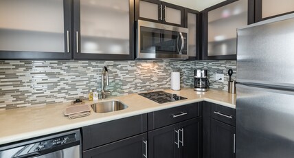 Staybridge Suites Saskatoon - University, an IHG hotel Room Type - 1 King Studio Suite Kitchen