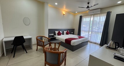 RIVULET Mukkam, Calicut. Room Type - Standard room with AC