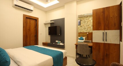 HOTEL PRIDE & RESTAURANT Room Type - Deluxe Room