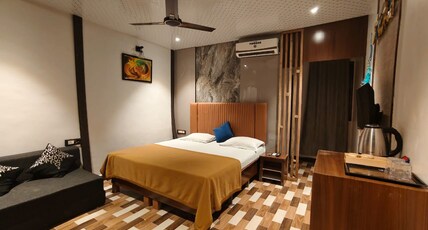 Ocean Park Resort Room Type - Super Deluxe AC Room with Garden View