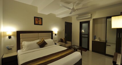 Hotel Le Grande Residency Room Type - Executive Room ( Only King Size bed ) Unmarried couples and locals are not allowed)