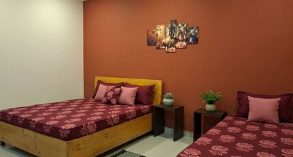 Mangaldeep Bhawan Room Type - Zen maroon retreat with King + Single bed