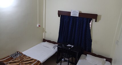 Hazarika Lodge Room Type - Standard Non-AC Room (Common washroom)