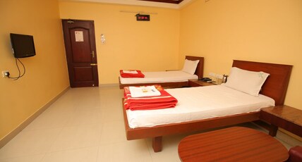 Malar Residency Room Type - Family Room AC