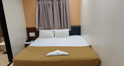Hotel Suvarnam Residency Room Type - Deluxe King Bed Room