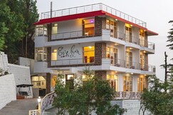 Evelyn Homes : In The Lap Of Mountains