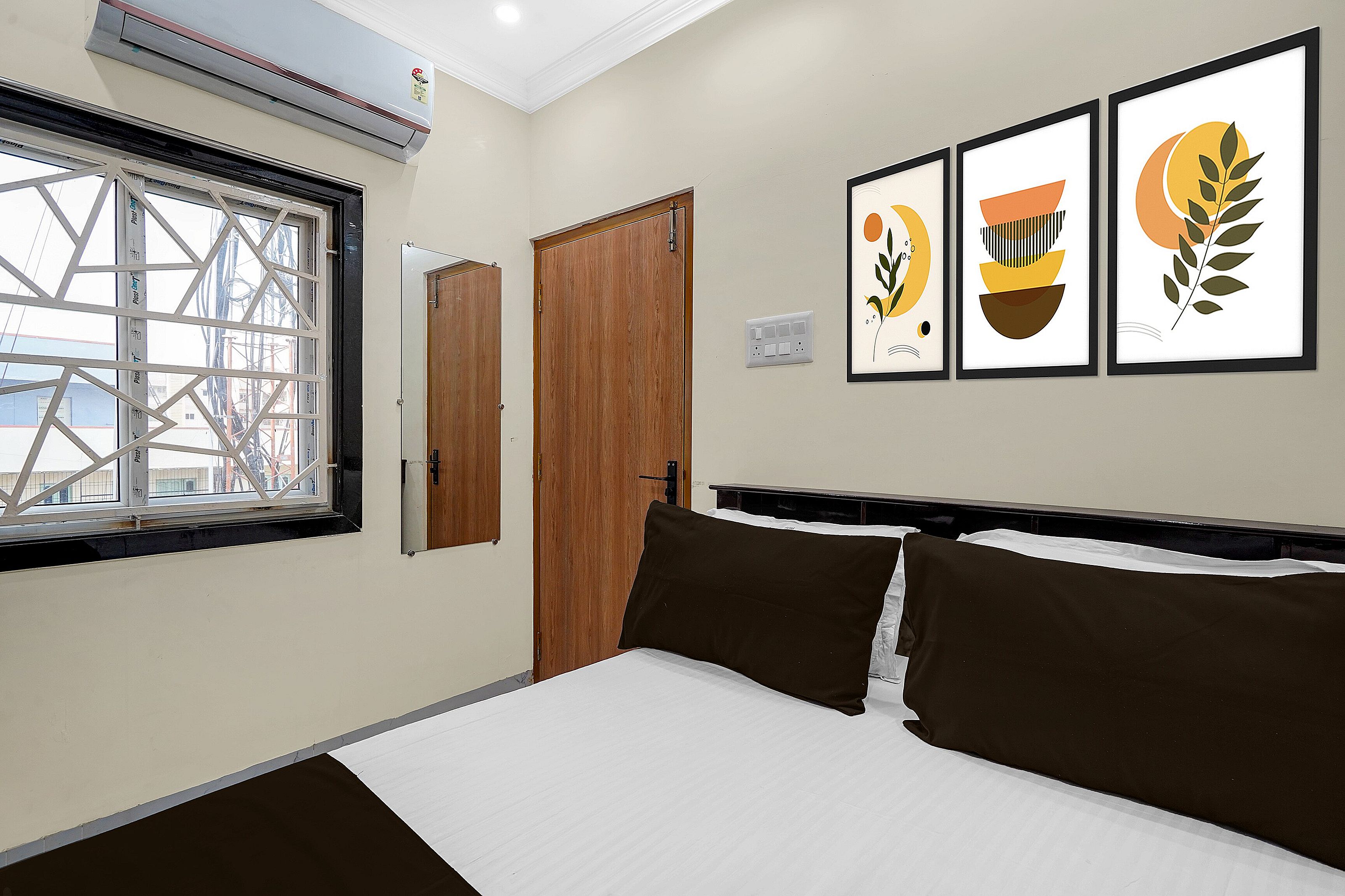 Hotel O The Royal Guest Rooms - Tap to explore photos