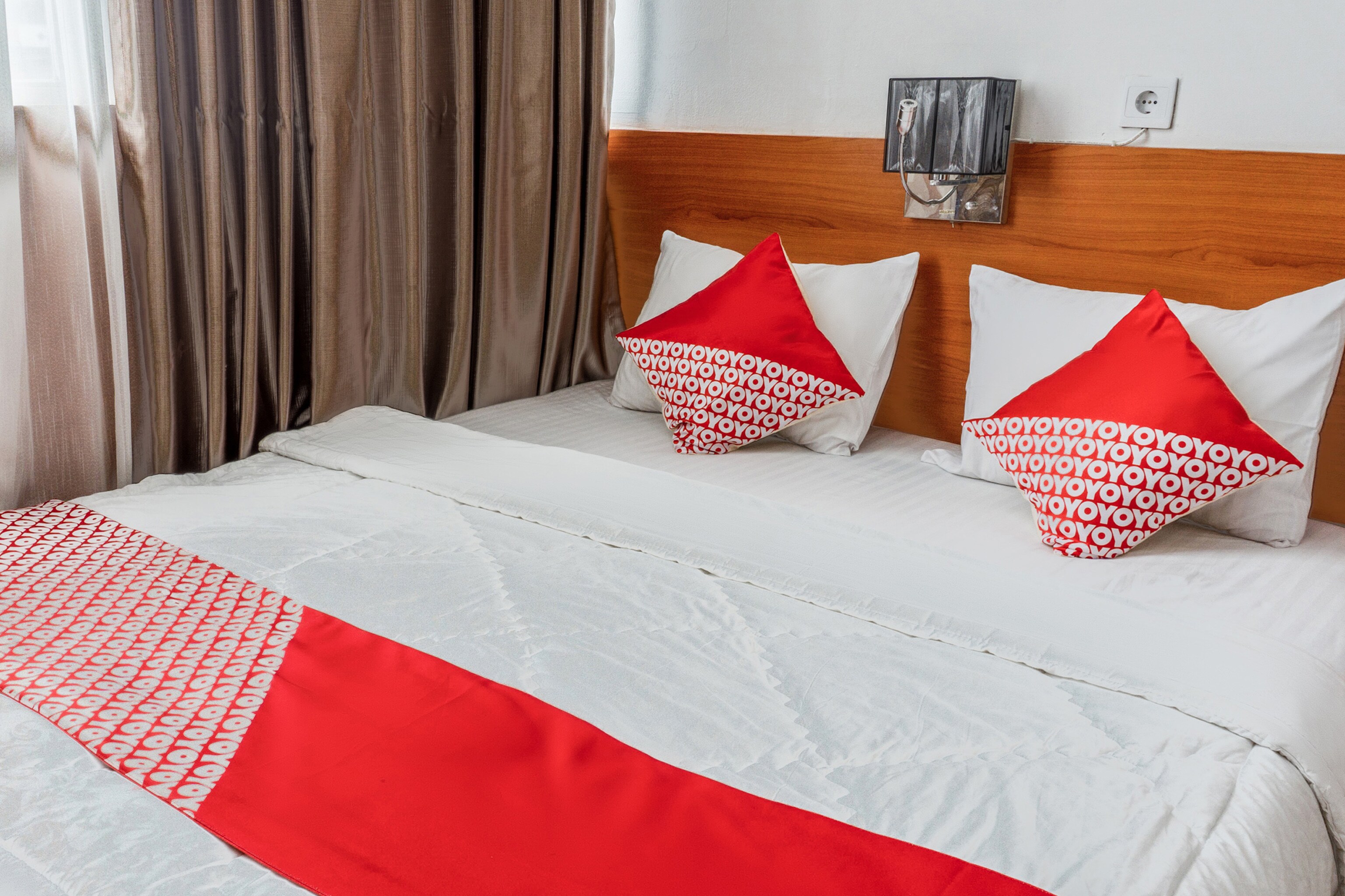 Hotel O Mandiri Guest House Syariah - Tap to explore photos
