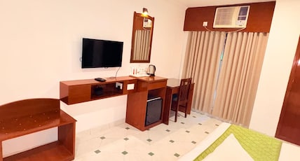 Myriad - Tekarees Inn Room Type - Super Deluxe Room,15 Percent Discount on Lunch and Dinner,Free Wi-Fi Myriad - Tekarees Inn Room Type - Super Deluxe Room,15 Percent Discount on Lunch and Dinner,Free Wi-Fi