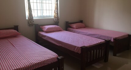 Shantham Service Apartments Room Type - Deluxe Triple Room AC