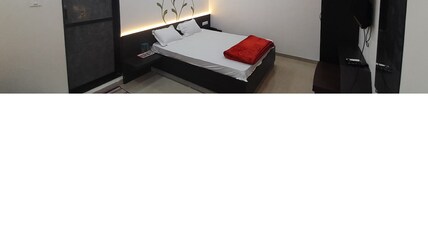 THE MANGO BITE HOTEL & RESTAURANT Room Type - Super Deluxe Room